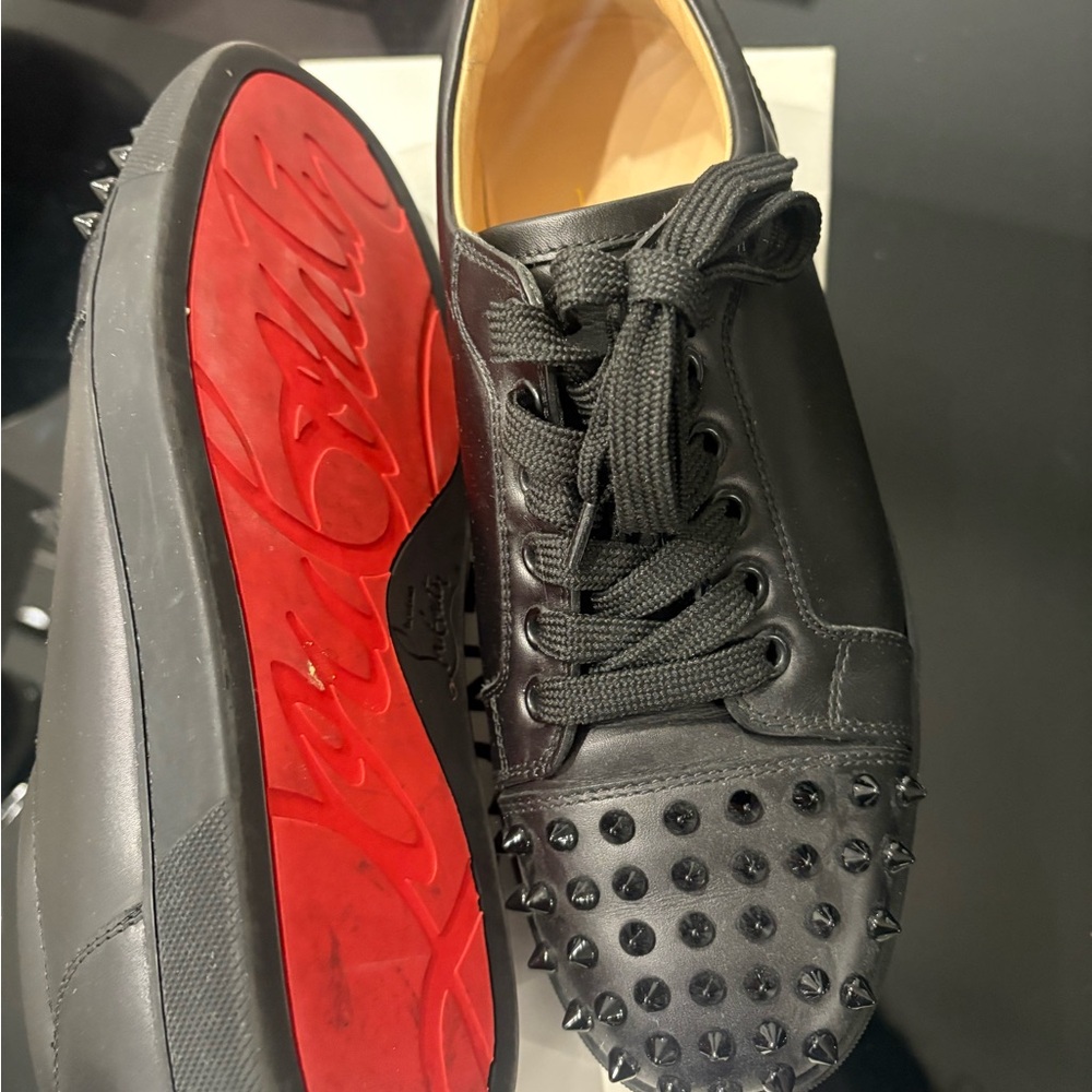 Christian Louboutin Black Spiked Sneakers with Red Soles